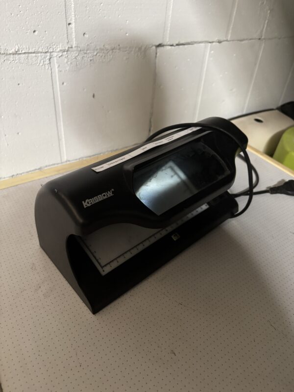 Counterfeit money checker